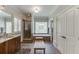Well-lit bathroom with double vanity, walk-in shower, and bright natural light at 2623 Lindsey Grace Ln, Buford, GA 30519