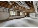 Large unfinished basement area with exposed ceiling, concrete floor and several windows at 2623 Lindsey Grace Ln, Buford, GA 30519