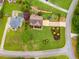 Expansive backyard with pool, mature trees, and patio area at 638 Oberlochen Way, Douglasville, GA 30134
