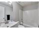A clean, well-lit bathroom with a tub/shower combination and a single sink vanity at 638 Oberlochen Way, Douglasville, GA 30134