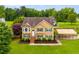 Charming two-story home with manicured lawn and ample parking at 638 Oberlochen Way, Douglasville, GA 30134