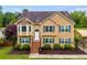 Charming two-story home with manicured lawn and ample parking at 638 Oberlochen Way, Douglasville, GA 30134