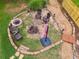 Cozy fire pit area with seating and decorative features, perfect for enjoying evenings outdoors at 638 Oberlochen Way, Douglasville, GA 30134