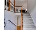 Inviting foyer with staircase and hardwood floors at 638 Oberlochen Way, Douglasville, GA 30134