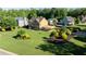 Attractive home with lush lawn, mature trees, and covered parking; perfect for a Gathering seeking comfort and style at 638 Oberlochen Way, Douglasville, GA 30134