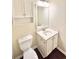 Well-lit half bathroom with white vanity at 759 Hennepin Ter, Mcdonough, GA 30253