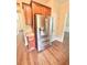 Kitchen with stainless steel refrigerator and stained wood cabinets at 759 Hennepin Ter, Mcdonough, GA 30253