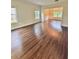 Bright, open living room with hardwood floors and natural light at 759 Hennepin Ter, Mcdonough, GA 30253