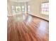 Bright and airy living area with lots of natural light from large windows at 759 Hennepin Ter, Mcdonough, GA 30253
