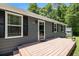Charming single-story home with a well-kept front porch and manicured lawn at 130 Driver St, Temple, GA 30179