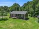 Charming single-story home featuring a well-maintained yard and a welcoming front porch at 130 Driver St, Temple, GA 30179