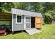 Spacious storage shed with ramp access, ideal for storing equipment and tools at 130 Driver St, Temple, GA 30179
