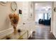 Elegant hallway with console table and decor, leading to the living areas at 1431 Beckett Dr, Hampton, GA 30228