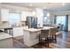 Modern kitchen with stainless steel appliances, granite countertops, and a center island at 1431 Beckett Dr, Hampton, GA 30228