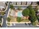 Overhead view of the community pool and surrounding parking area and greenery at 255 Kendemere Pointe, Roswell, GA 30075