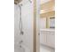 Bright white bathroom with tub and shower at 255 Kendemere Pointe, Roswell, GA 30075