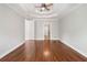 Spacious bedroom with tray ceilings and hardwood floors at 255 Kendemere Pointe, Roswell, GA 30075