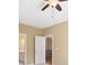 Bedroom with a ceiling fan and ensuite bathroom at 255 Kendemere Pointe, Roswell, GA 30075