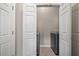 Laundry room with tile floor and stainless steel washer and dryer at 255 Kendemere Pointe, Roswell, GA 30075