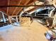 Functional attic featuring storage, insulated pipes, wooden beams and space to move around at 3165 Blackshear Dr, Marietta, GA 30060