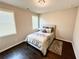 Comfortable bedroom with dark hardwood floors and lots of natural light at 3165 Blackshear Dr, Marietta, GA 30060
