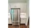 Stainless steel refrigerator in a bright kitchen with white cabinets and countertops at 3165 Blackshear Dr, Marietta, GA 30060