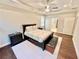 Spacious main bedroom with tray ceilings, fan, and sitting area at 3165 Blackshear Dr, Marietta, GA 30060