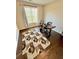 Home office space with hardwood floors and a large bright window at 3165 Blackshear Dr, Marietta, GA 30060