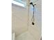 Modern shower with subway tile, bronze fixtures and bright window at 3165 Blackshear Dr, Marietta, GA 30060