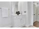 Bathroom featuring a white vanity cabinet with marble countertop and decorative elements at 2255 Lenox Ridge Ne Ct, Atlanta, GA 30319