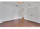 Spacious bedroom with hardwood floors, large closet, and neutral paint at 2255 Lenox Ridge Ne Ct, Atlanta, GA 30319
