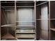 Well-organized closet system with shelves, drawers, and ample hanging space for storage at 2255 Lenox Ridge Ne Ct, Atlanta, GA 30319