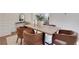 Elegant dining room featuring a modern table with comfortable upholstered chairs at 2255 Lenox Ridge Ne Ct, Atlanta, GA 30319
