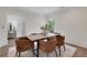 Elegant dining room featuring a modern table with comfortable upholstered chairs at 2255 Lenox Ridge Ne Ct, Atlanta, GA 30319