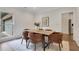 Elegant dining room featuring a modern table with comfortable upholstered chairs and natural light at 2255 Lenox Ridge Ne Ct, Atlanta, GA 30319