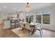 Dining room with modern light fixture, bar seating, and natural light at 2255 Lenox Ridge Ne Ct, Atlanta, GA 30319