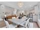 Open concept dining room flowing into kitchen and living area at 2255 Lenox Ridge Ne Ct, Atlanta, GA 30319