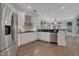 Bright kitchen with stainless steel appliances, white cabinets, and a breakfast bar at 2255 Lenox Ridge Ne Ct, Atlanta, GA 30319