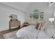 Main bedroom with vaulted ceilings, a wooden dresser, and ample natural light at 2255 Lenox Ridge Ne Ct, Atlanta, GA 30319