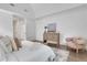 Spacious main bedroom with vaulted ceilings, an artistic print, and an accent chair at 2255 Lenox Ridge Ne Ct, Atlanta, GA 30319