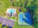 Aerial view of community amenities includes a pool and tennis courts at 435 Flowering Trl, Grayson, GA 30017