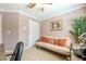 Comfortable bedroom furnished with a futon, desk, and ample space for relaxation at 435 Flowering Trl, Grayson, GA 30017