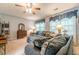 Relaxing living room featuring plush sofas, windows with valances, and stylish decor at 435 Flowering Trl, Grayson, GA 30017