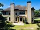 Spacious backyard view showcasing the home's architecture and outdoor living space at 533 Mount Gerizim Se Rd, Mableton, GA 30126