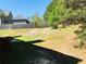 View of the backyard and trees behind the property at 533 Mount Gerizim Se Rd, Mableton, GA 30126