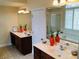 Bathroom with double vanity, lots of counter space, and large window at 533 Mount Gerizim Se Rd, Mableton, GA 30126