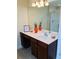 Bathroom vanity features white countertop and stylish dark wood cabinets at 533 Mount Gerizim Se Rd, Mableton, GA 30126