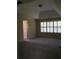 Spacious bedroom with tray ceiling, neutral walls, and natural light at 533 Mount Gerizim Se Rd, Mableton, GA 30126