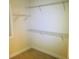 Walk-in closet with white wire shelving for organization at 533 Mount Gerizim Se Rd, Mableton, GA 30126