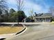 Neighborhood clubhouse with adjacent playground, parking lot, and well-kept lawn at 533 Mount Gerizim Se Rd, Mableton, GA 30126